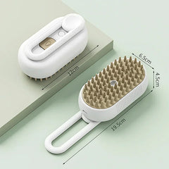 "3-in-1 cat steam brush with 360° rotating handle for hair removal and massage"