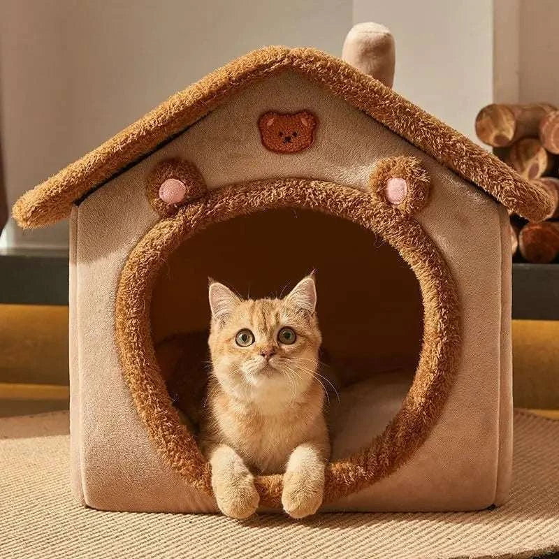 Foldable pet house with removable dog bed for small to medium cats and dogs.