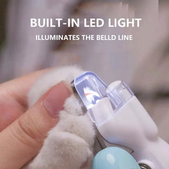 Professional pet nail clippers with LED light for safe trimming.
