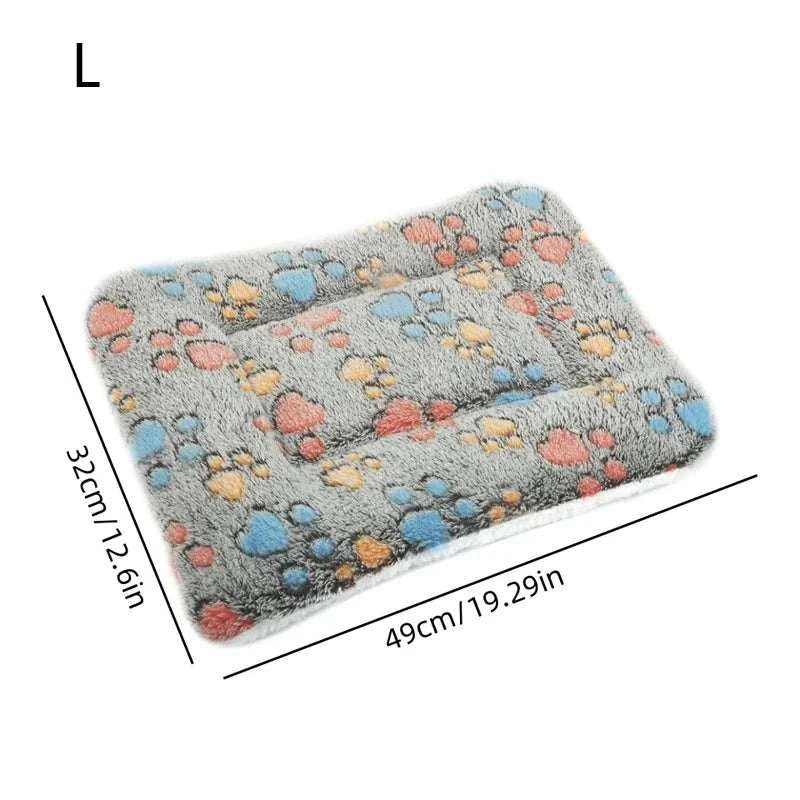 Flannel thickened dog bed mat with paw print design for winter warmth and comfort.