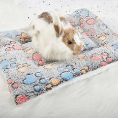 Flannel thickened dog bed mat with paw prints, soft and warm for winter.
