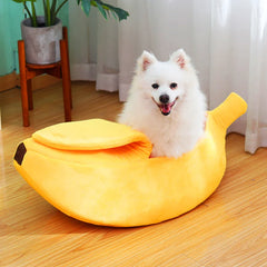 Banana shaped pet bedding with fluffy dog inside, cozy cat nest mat and dog sleeping bag.