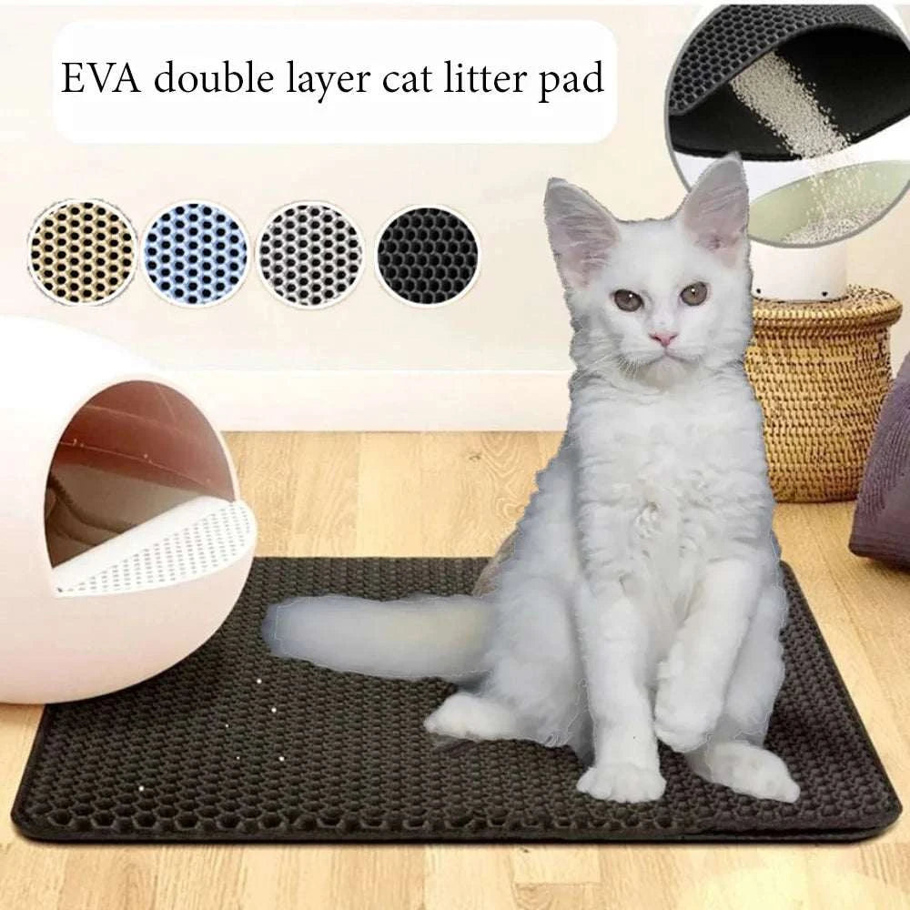 Cat sitting on a waterproof, double-layer, non-slip litter trapping mat, designed for easy cleaning and maintenance.