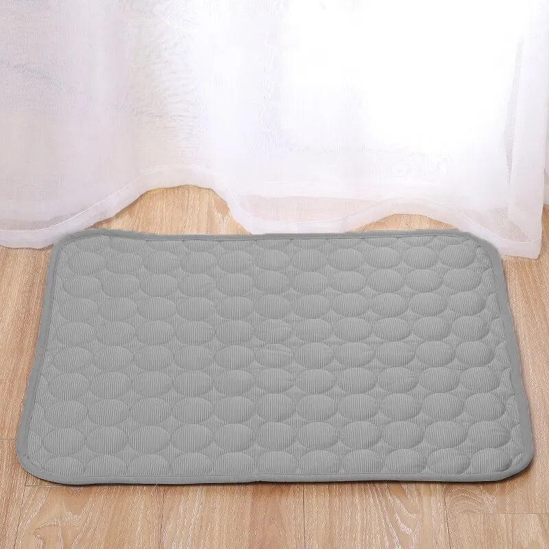 "Grey ice silk cooling pad for small pets, ideal for summer comfort"