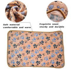Soft fluffy cartoon pet blanket with paw prints, cozy and warm mat for cats and dogs.