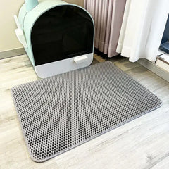 "Double layer waterproof cat litter mat with non-slip base and washable surface"