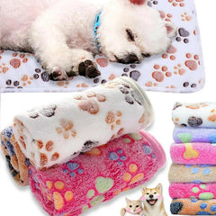 Soft fluffy cartoon pet blanket for cats and dogs with paw print design, cozy and warm.