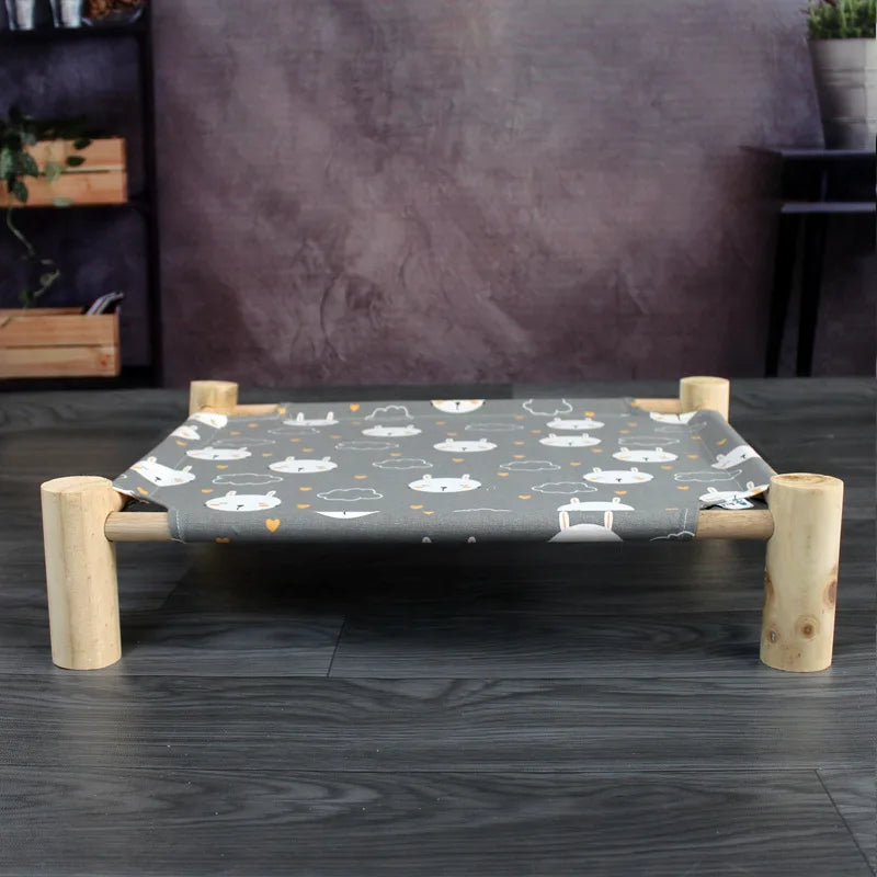 "Detachable raised cat hammock bed with moisture-proof washable mat, ideal for cats and small dogs"
