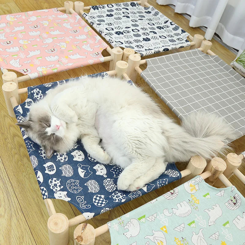 "Detachable raised cat hammock bed with moisture-proof washable mat, ideal for cats and small dogs"