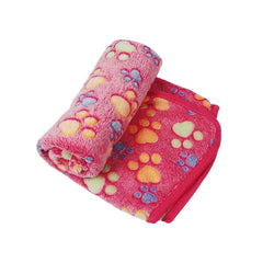 Soft fluffy cartoon pet blanket with colorful paw print design, cozy and warm mat for cats and dogs.