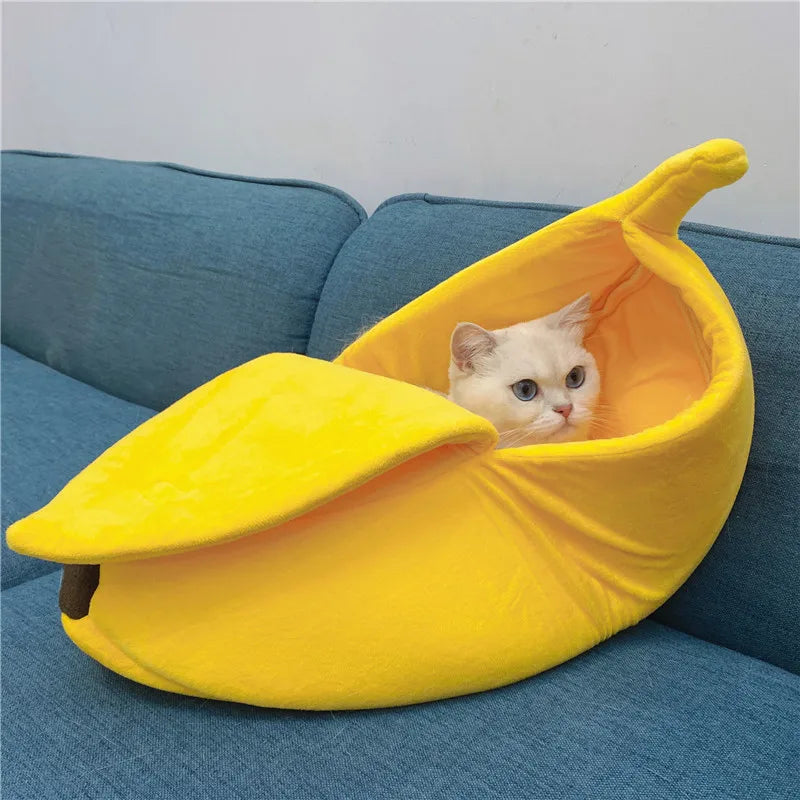 Banana shaped pet bedding with cozy cat nest mat and dog sleeping bag design.