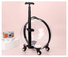 "Rolling pet travel trolley with wheels and transparent capsule carrier in pink and green"