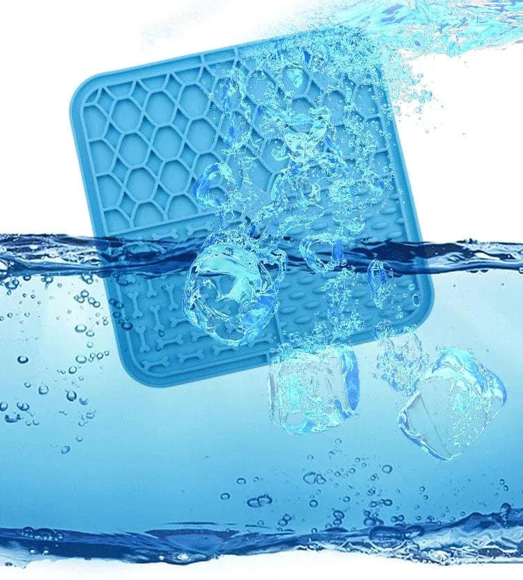 Silicone pet lick mat for dogs, slow feeder and bath distraction tool, shown under water with a strong suction.