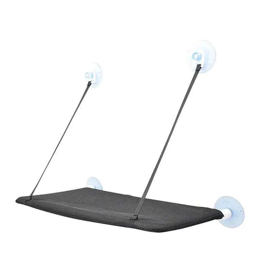 "Hanging cat bed hammock mounted by a sunny window for climbing cats"