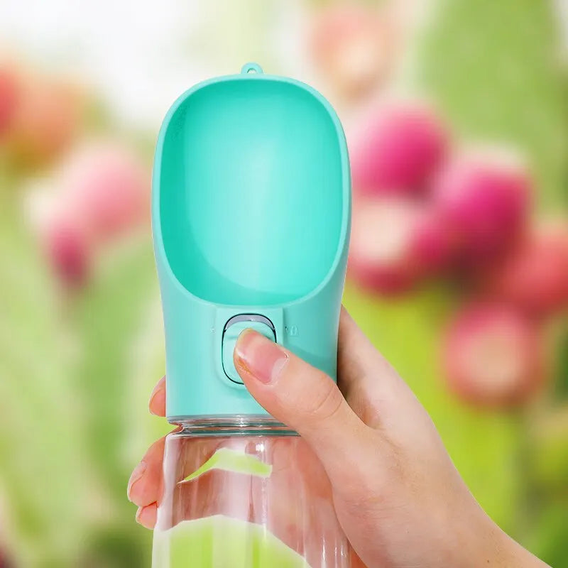 Portable pet travel water bottle with easy-pour drinking bowl for dogs and cats.