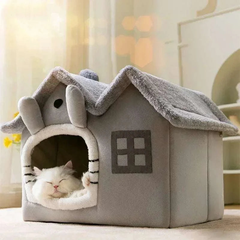 Fluffy grey half-closed dog bed with a sleeping cat inside, showcasing a cozy and secure pet sleeping nest.