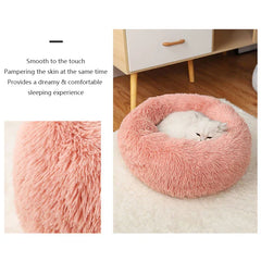 "Round plush pet bed in soft fabric, ideal for keeping pets warm in winter"machine washable dog beds