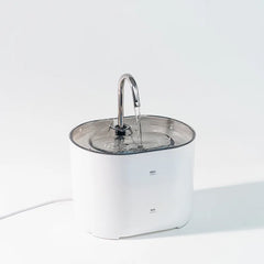 Stainless steel automatic pet water fountain with cycle filters and ultra-silent pump, designed for cats and dogs to ensure fresh drinking water.