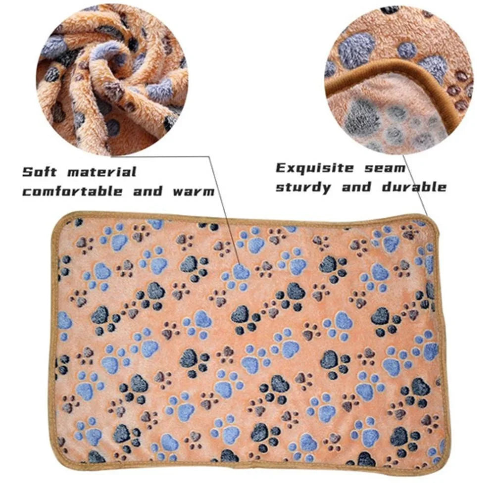 Soft fluffy cartoon pet blanket with paw prints design, cozy and warm mat for cats and dogs.
