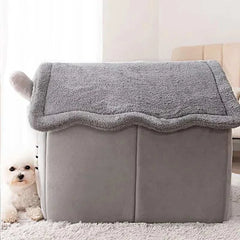 Indoor warm dog house with soft fabric and removable cushion.
