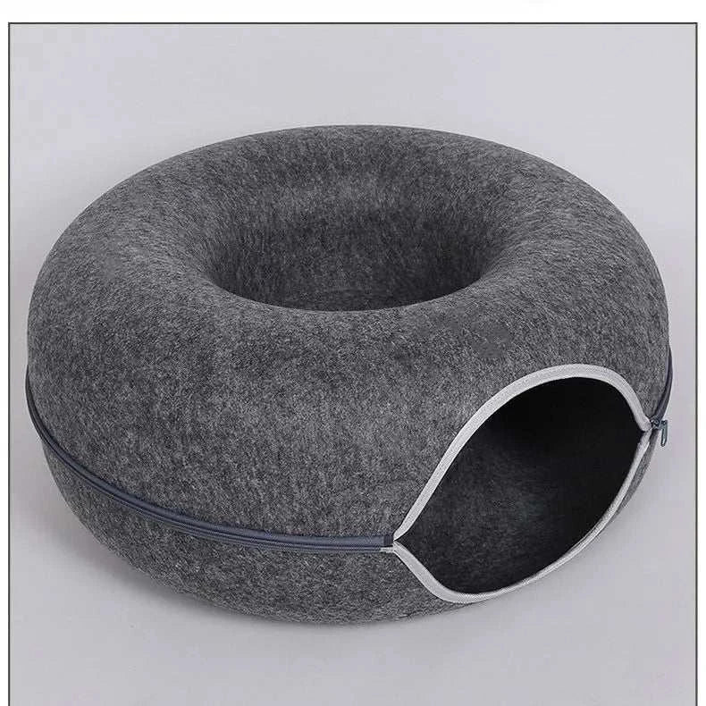 "Donut cat bed with interactive tunnel for playful indoor cats"