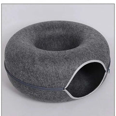 "Donut cat bed with interactive tunnel for playful indoor cats"