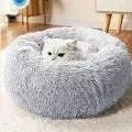 Super Warm Cat Bed with plush cushion, cozy nest design for pets.