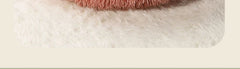 "Round plush pet bed in soft fabric, ideal for keeping pets warm in winter"machine washable dog beds