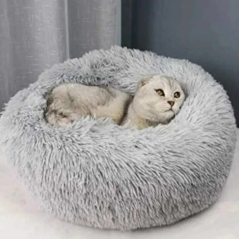 Super warm cat bed with long plush cushion for cats and small dogs.