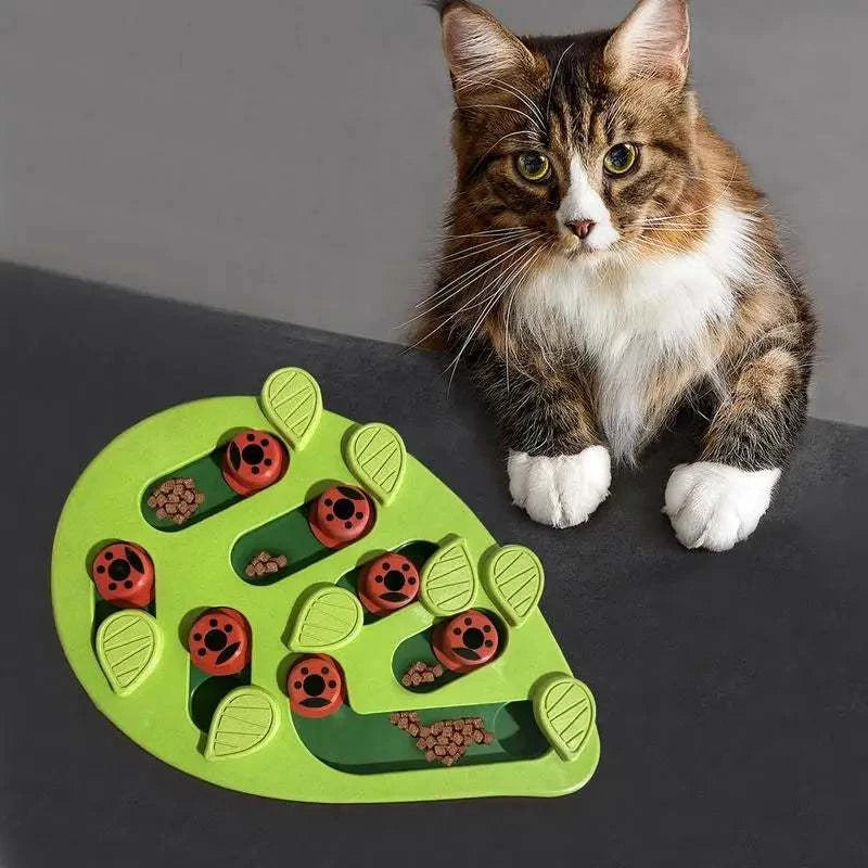 Interactive green leaf shaped slow feeder puzzle toy for cats, promoting mental stimulation and healthy eating.