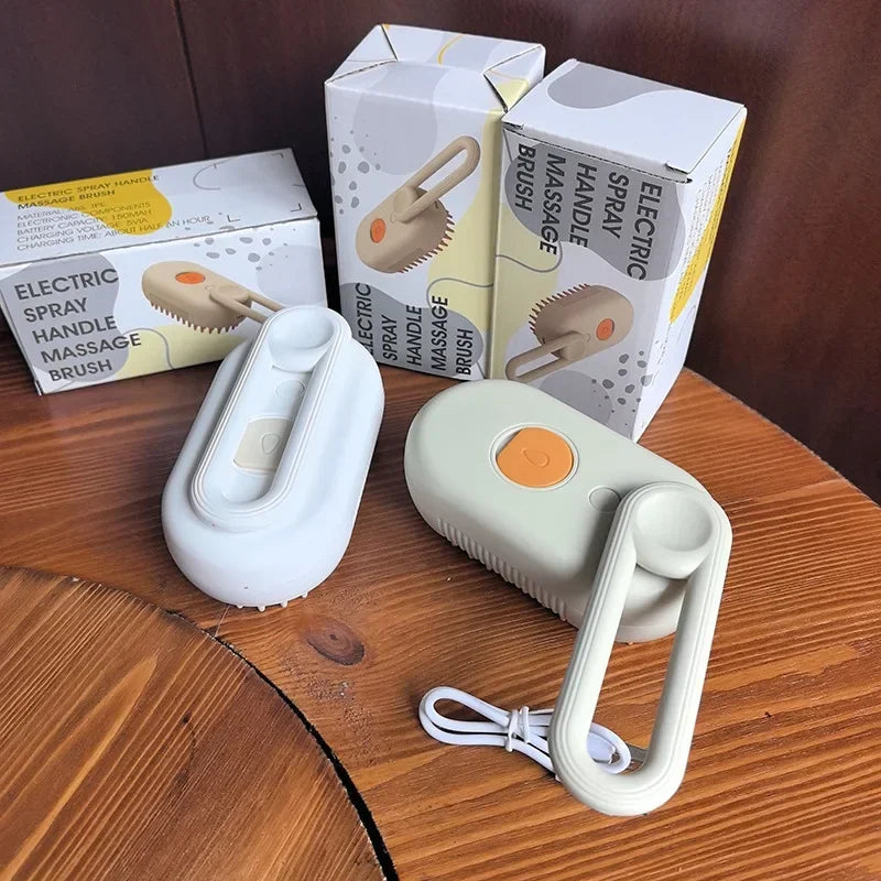 "3-in-1 cat steam brush with 360° rotating handle for hair removal and massage"