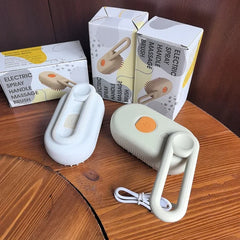 "3-in-1 cat steam brush with 360° rotating handle for hair removal and massage"