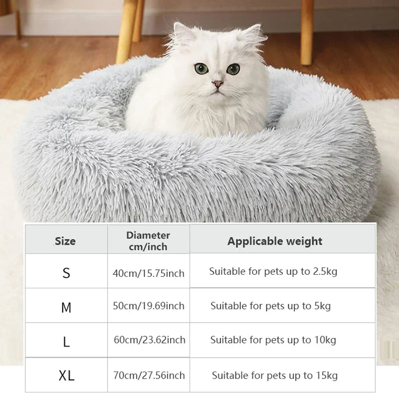"Round plush pet bed in soft fabric, ideal for keeping pets warm in winter"machine washable dog beds