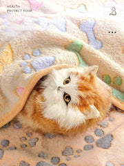 Soft flannel paw print pet blanket with cat, cozy and warm, no-shed design.