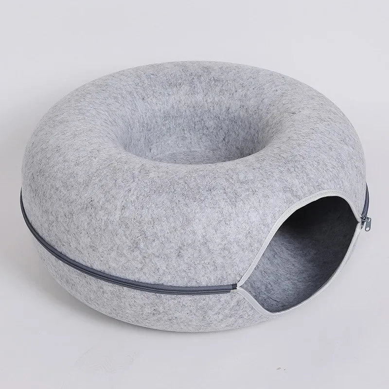 Round cat bed house with soft plush cushion, perfect for small pets.