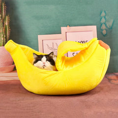 Banana-shaped pet bedding for cats and small dogs, cozy nest mat and sleeping bag.
