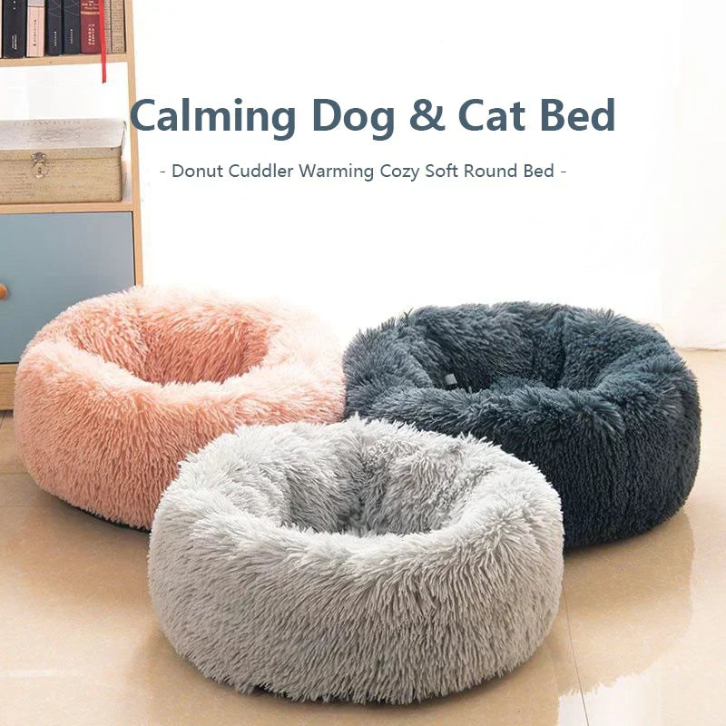 "Round plush pet bed in soft fabric, ideal for keeping pets warm in winter"machine washable dog beds