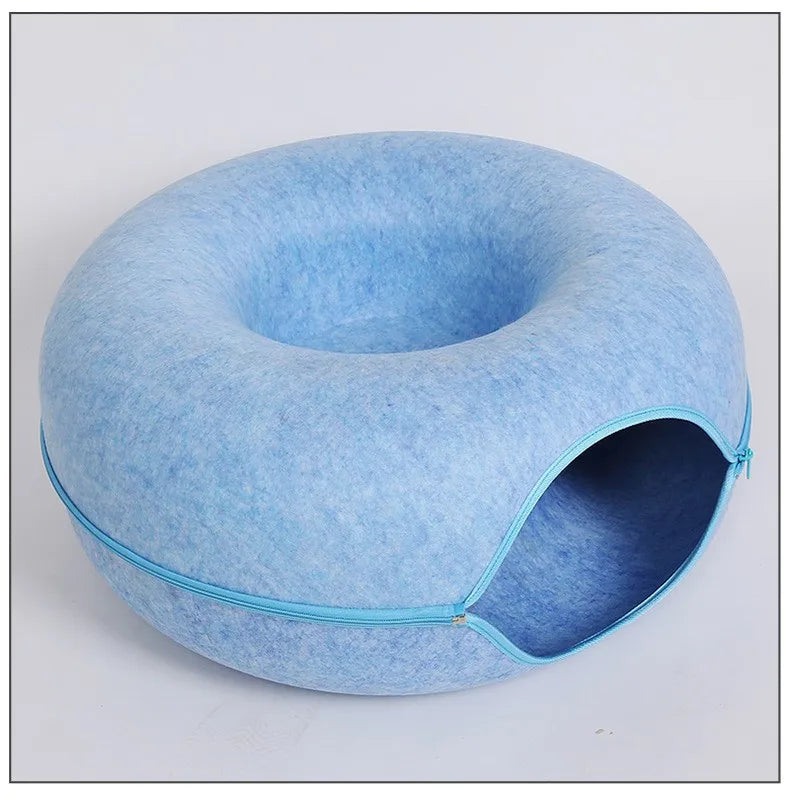 "Donut cat bed with interactive tunnel for playful indoor cats"