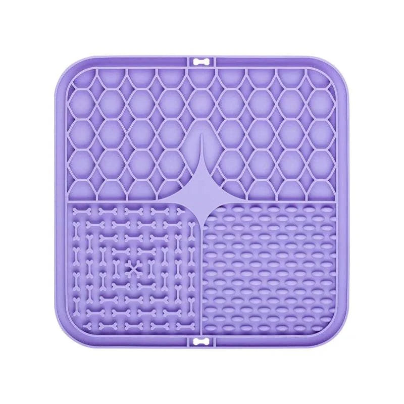 Silicone pet lick mat for dogs, slow feeder and bath distraction tool in purple, durable silicone with strong suction.