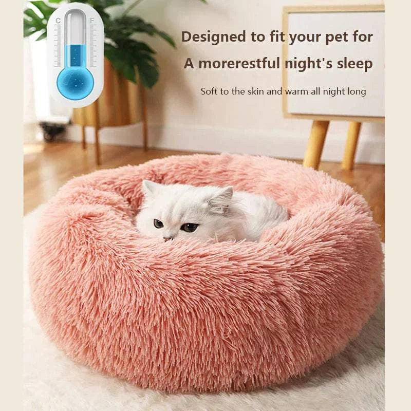"Round plush pet bed in soft fabric, ideal for keeping pets warm in winter"machine washable dog beds