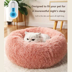 "Round plush pet bed in soft fabric, ideal for keeping pets warm in winter"machine washable dog beds