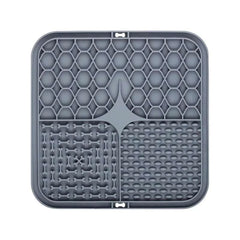 Silicone pet lick mat for dogs, slow feeder and bath distraction tool with strong suction and calming design.