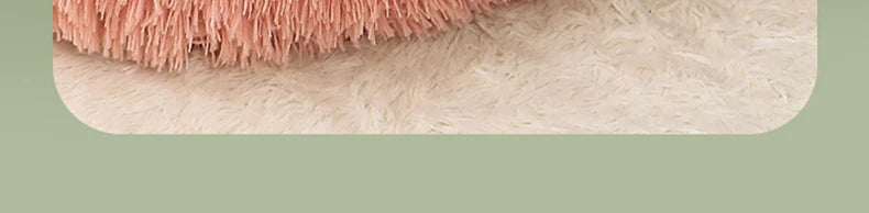 "Round plush pet bed in soft fabric, ideal for keeping pets warm in winter"machine washable dog beds
