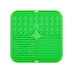 Green silicone pet lick mat with textured surface, designed as a slow feeder and bath distraction tool for dogs.