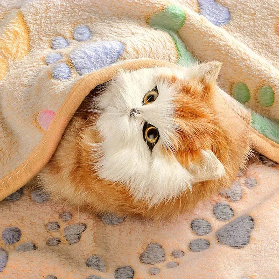Soft flannel paw print pet blanket for cats and dogs, warm and no-shed.