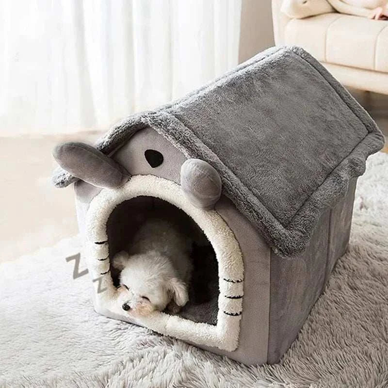 Indoor warm dog house with removable cushion for cozy pet comfort.