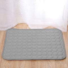 "Grey ice silk cooling pad for small pets, ideal for summer comfort"
