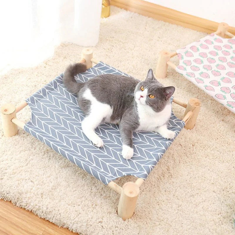 "Detachable raised cat hammock bed with moisture-proof washable mat, ideal for cats and small dogs"


