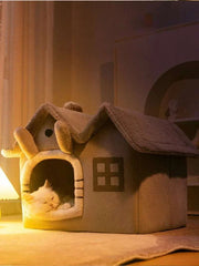 Cozy half-closed dog bed with a fluffy, foldable design for small pets.