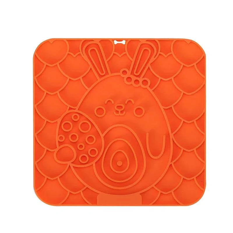 Silicone pet lick mat for dogs with slow feeder and bath distraction features.